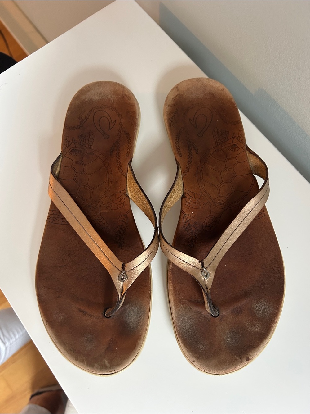 OluKai Metallic Bronze Leather Flip Flop Sandals
